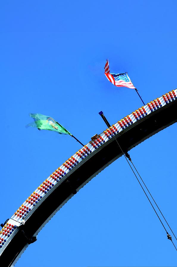 Flags And Ferris Wheels Photograph by Jerry Sodorff