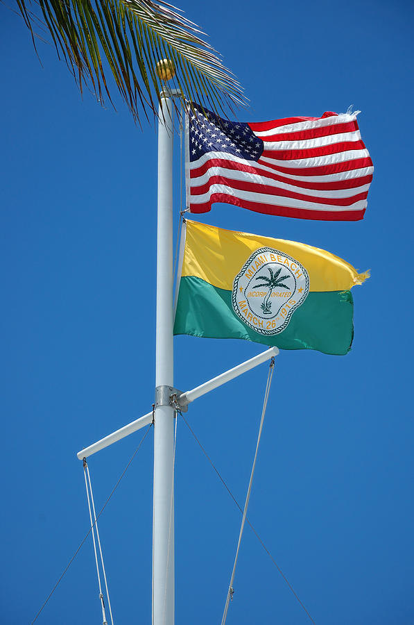 Flags at Beach Patrol HQ - Miami Photograph by Frank Mari