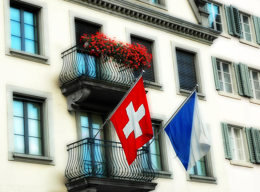 Flags of Switzerland and Zurich Photograph by Ginger Wakem