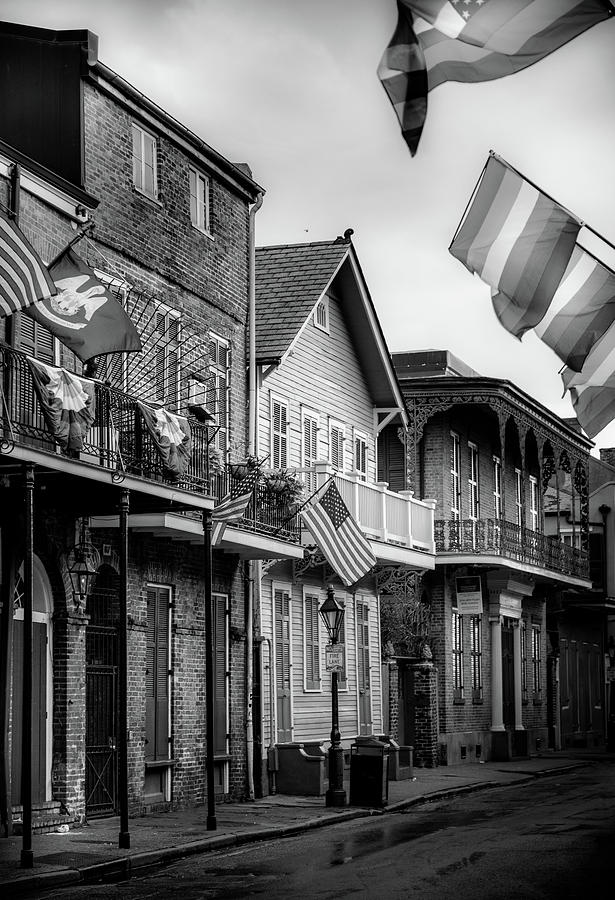 New Orleans Photograph - Flags On Bourbon In Black and White by Greg and Chrystal Mimbs