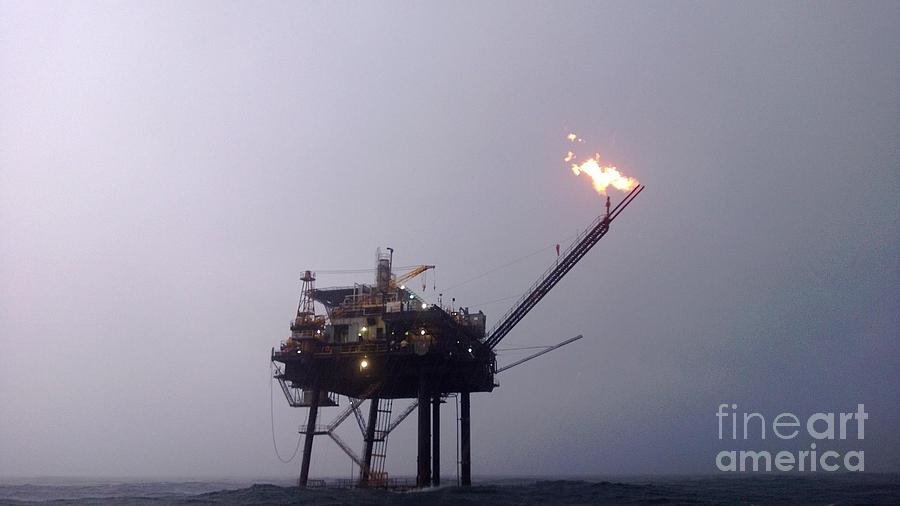 Flaring On The Water Photograph by Joseph Baril