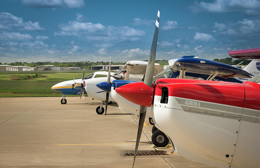 Airplane Photograph - Fleet on the Ramp by Phil And Karen Rispin