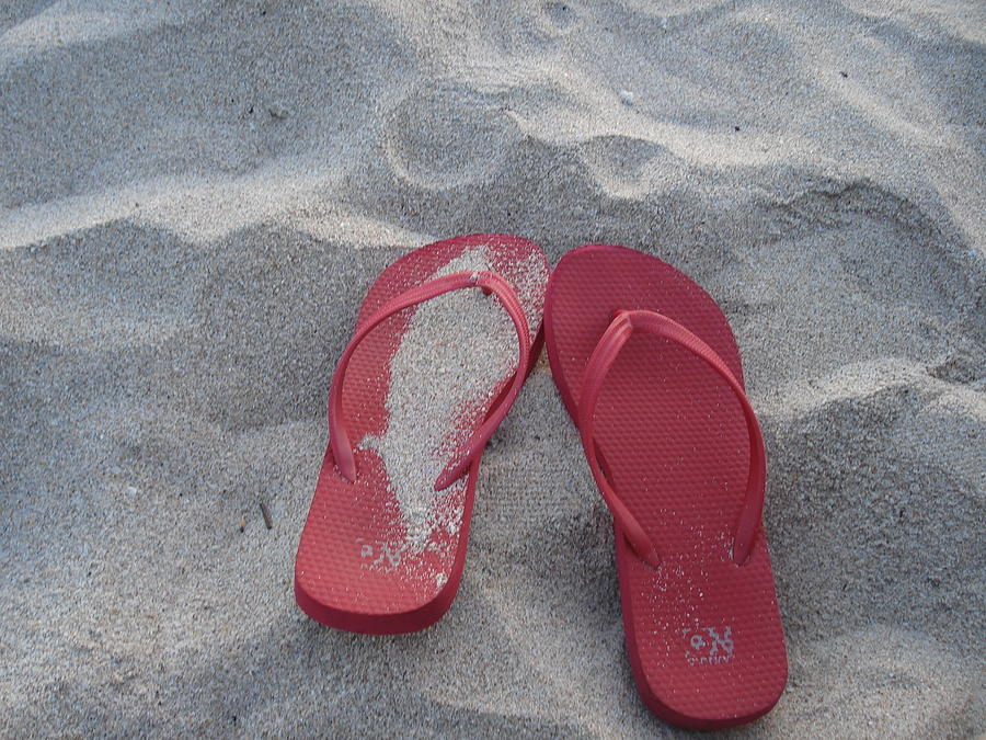 flip flops in the sand
