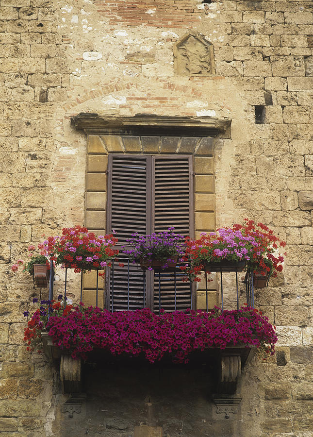 Architecture Photograph - Flower Covered Balcony by Axiom Photographic