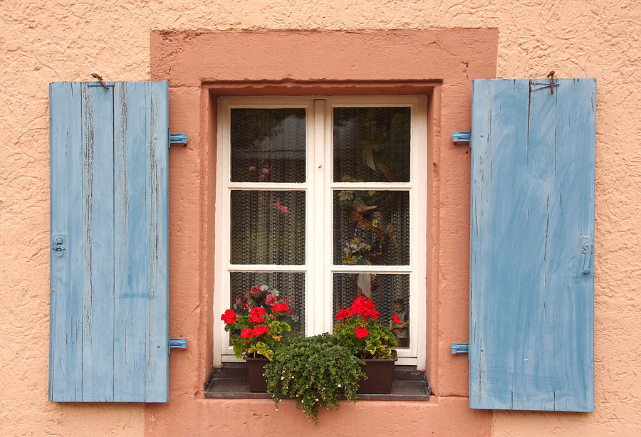 Summer Photograph - Flowered window with blue blinds on a pink wall by Laura Di Biase