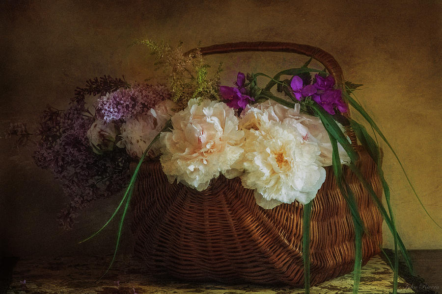 Flowers in a Basket Photograph by John Rivera