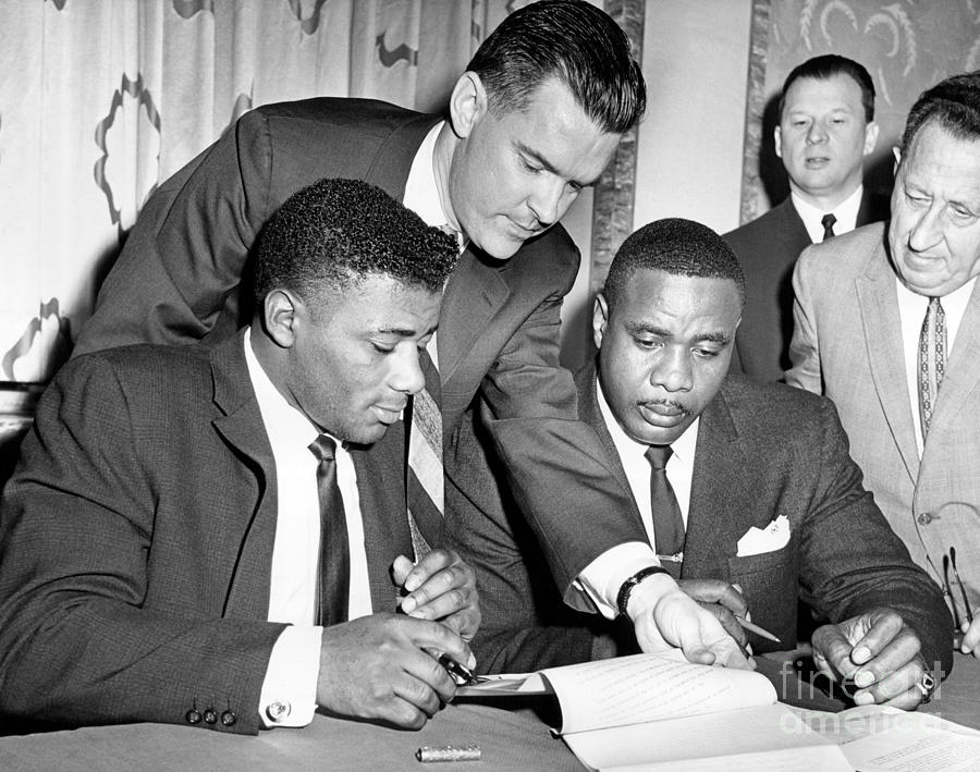 Floyd Patterson and Sonny Liston sign the contract for the next World ...