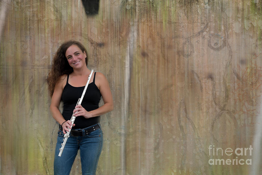 Flute player at the wall Photograph by Dan Friend