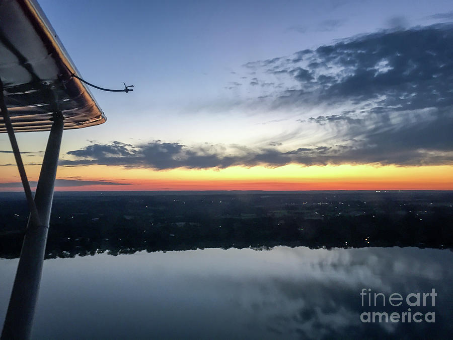 Sunset Photograph - Flying at sunset by Paul Quinn