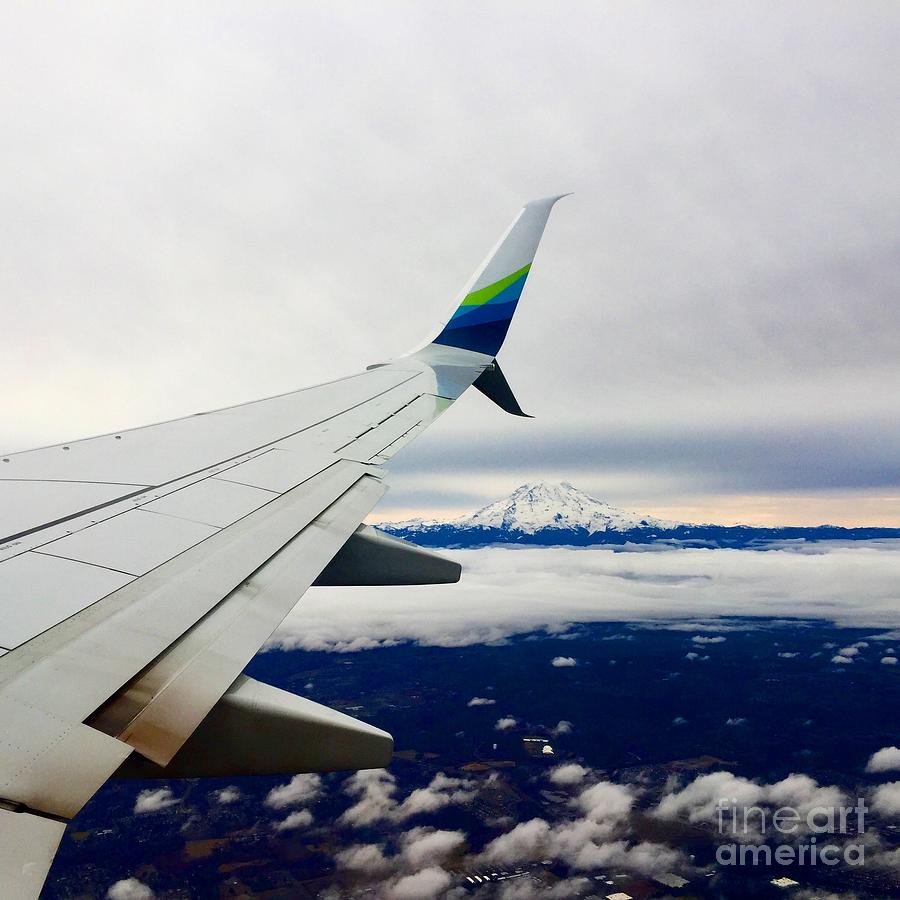 Airplane Photograph - Flying by the wing by LeLa Becker