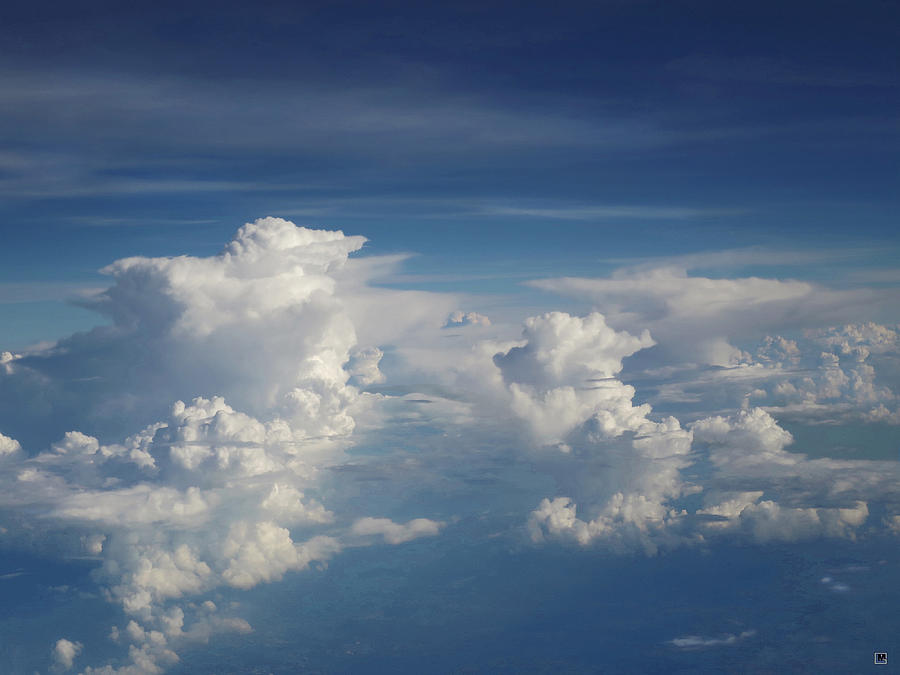 Flying High Above the Clouds 2 Photograph by Muriel Levison Goodwin ...