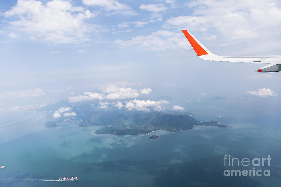 Flying over Hong Kong Photograph by Didier Marti