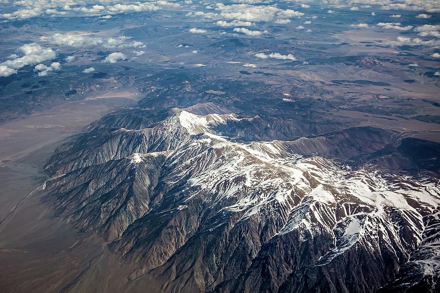 Flying Over Rocky Mountains In Spring At Day Time Photograph by Alex Grichenko