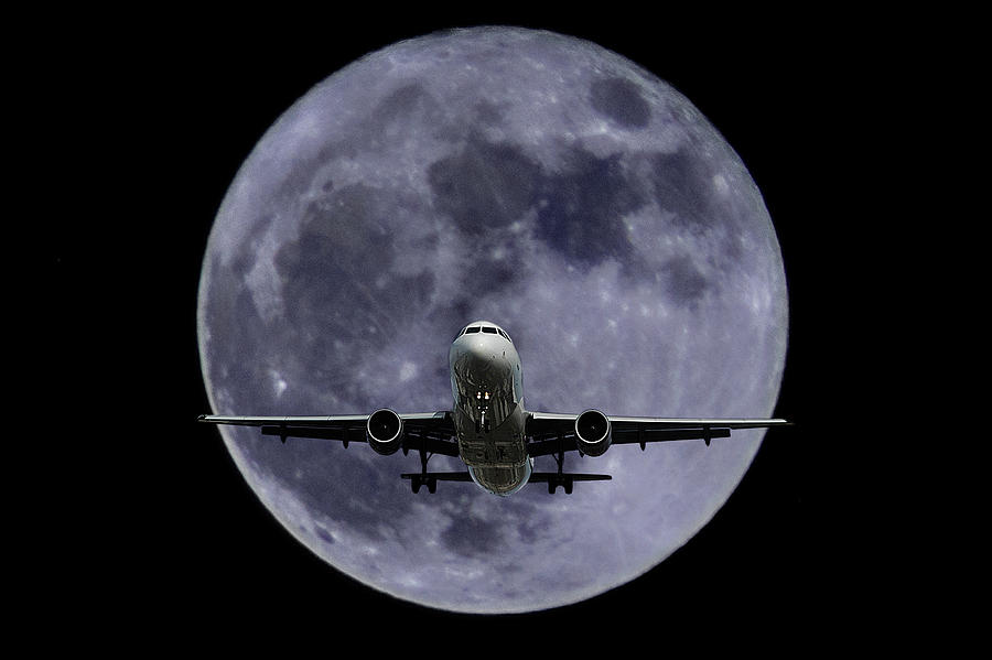 Flying through the full moon Photograph by Wolfgang Stocker