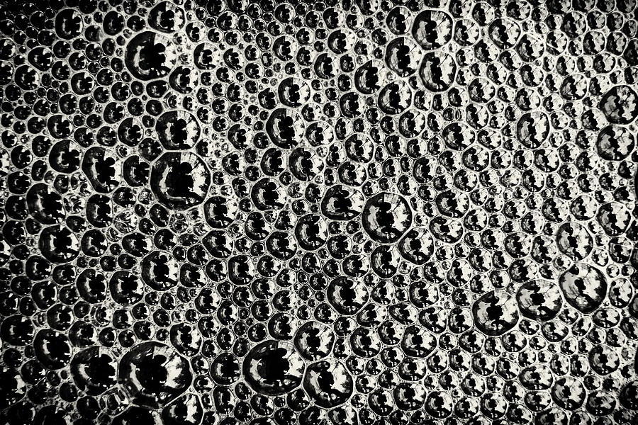 Foam Bubbles on Water Surface Photograph by John Williams