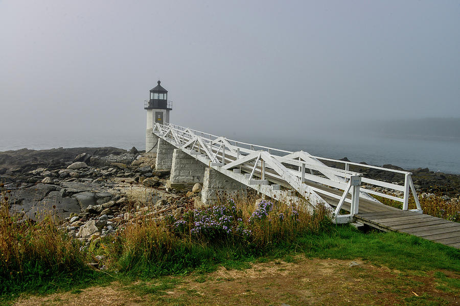 Fog rolls in at Marshall Point Lighthouse in Maine Photograph by Marilyn Burton