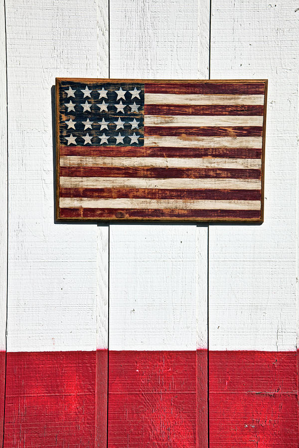 Still Life Photograph - Folk art American flag on wooden wall by Garry Gay