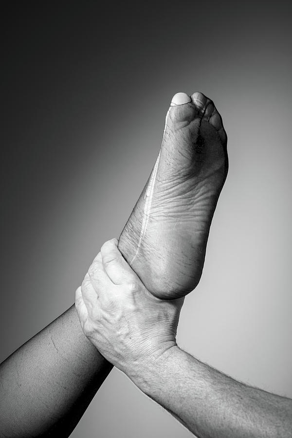 Foot And Hand Photograph