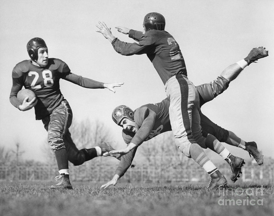 Football Action Shot, C.1940s Photograph by H. Armstrong Roberts/ClassicStock