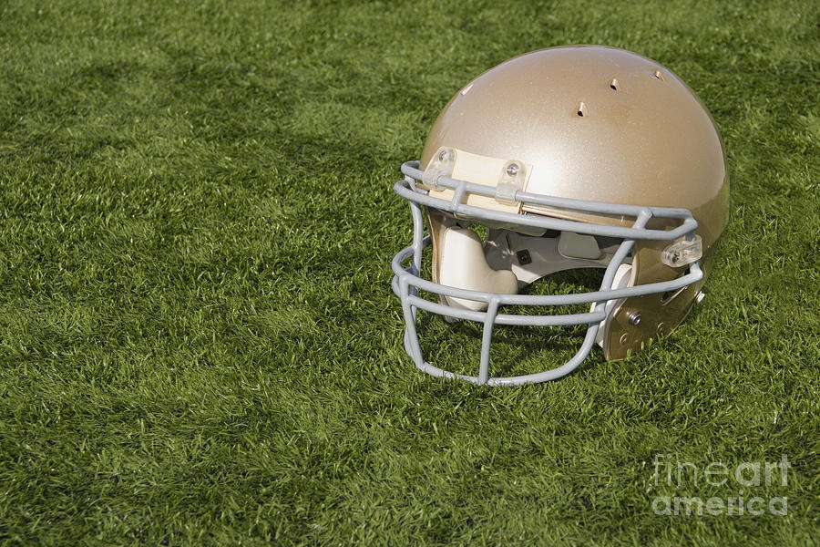 football helmet side view gold