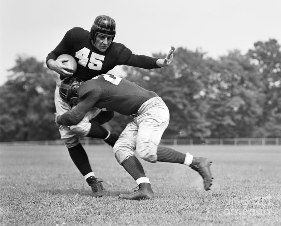 Football Photograph - Football Player Being Tackled, C.1940s by H. Armstrong Roberts/ClassicStock
