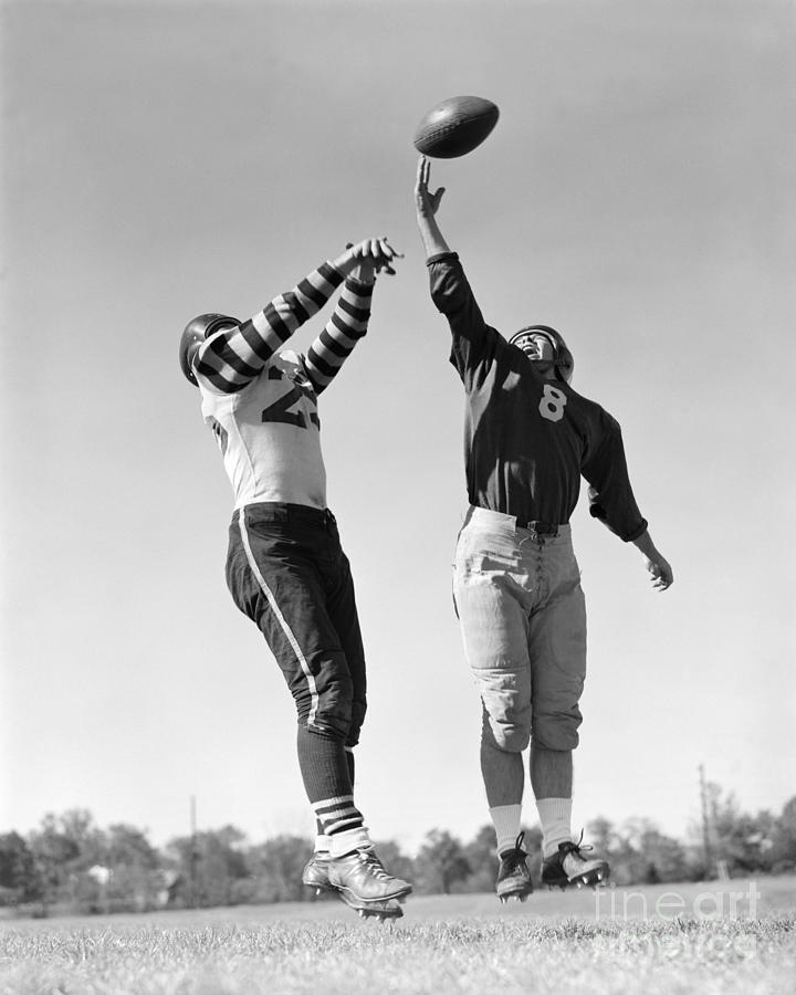 Football Players Jump For Ball Photograph by H. Armstrong Roberts/ClassicStock