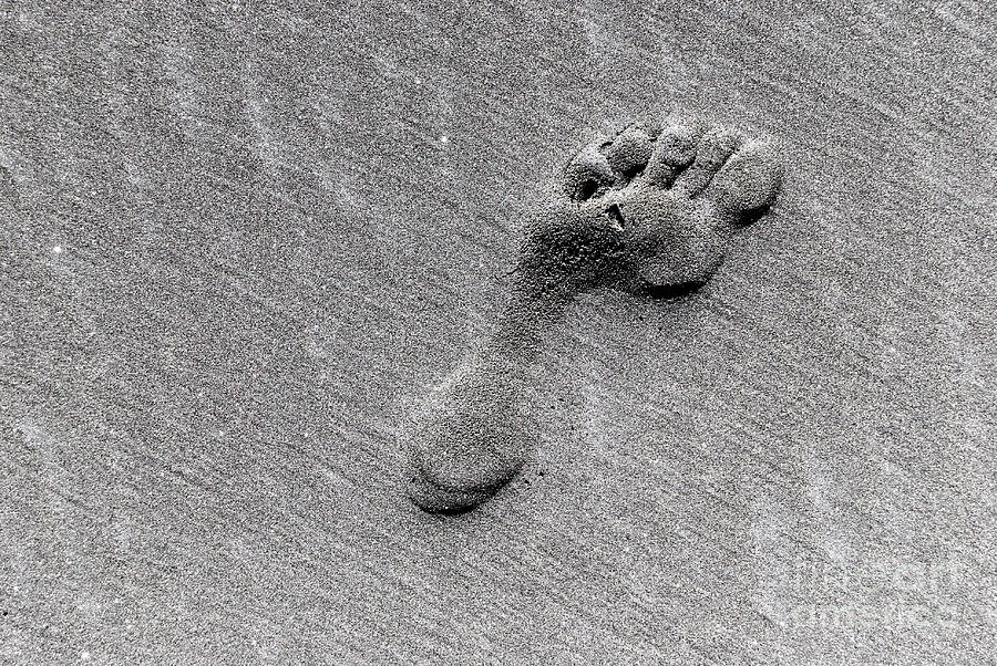 Footprint on the black sand Photograph by Yurix Sardinelly