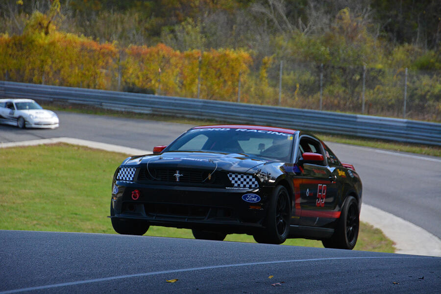 Ford Mustang at Lime Rock Photograph by Mike Martin