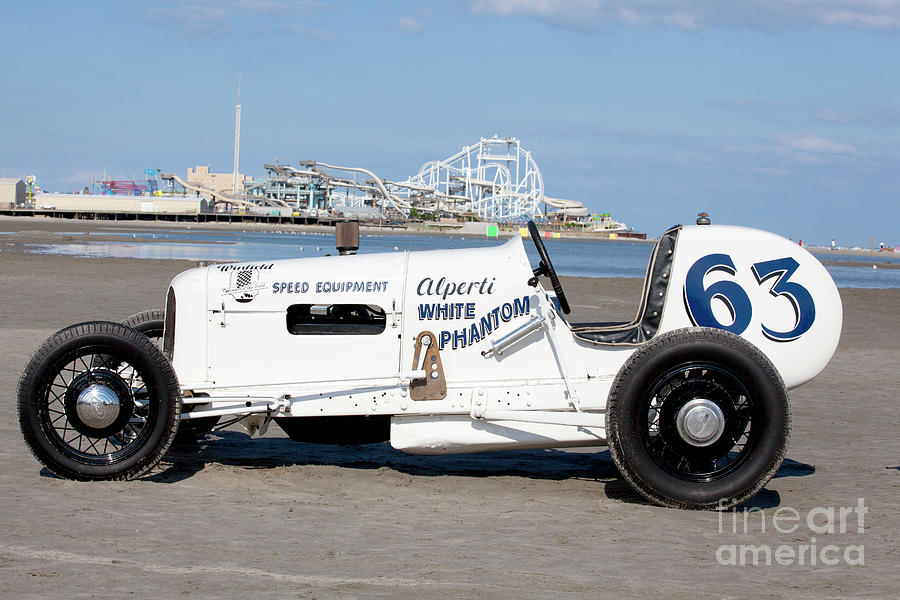 Ford White Phanton roadster race car on the beach Photograph by Anthony Totah