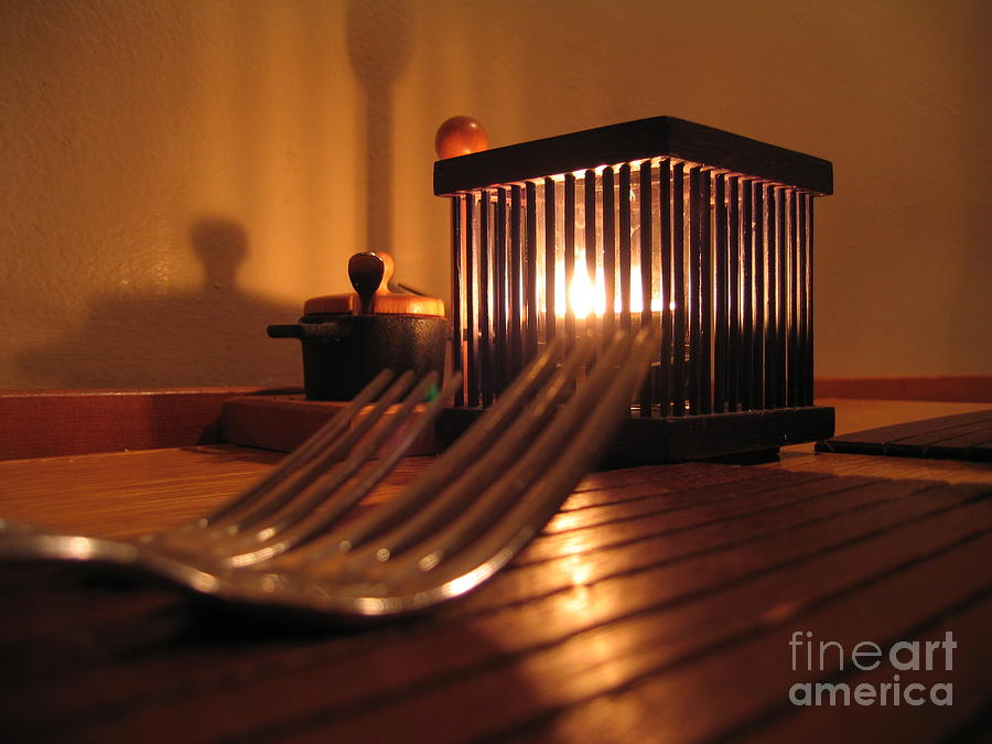 Forks And Candle Photograph