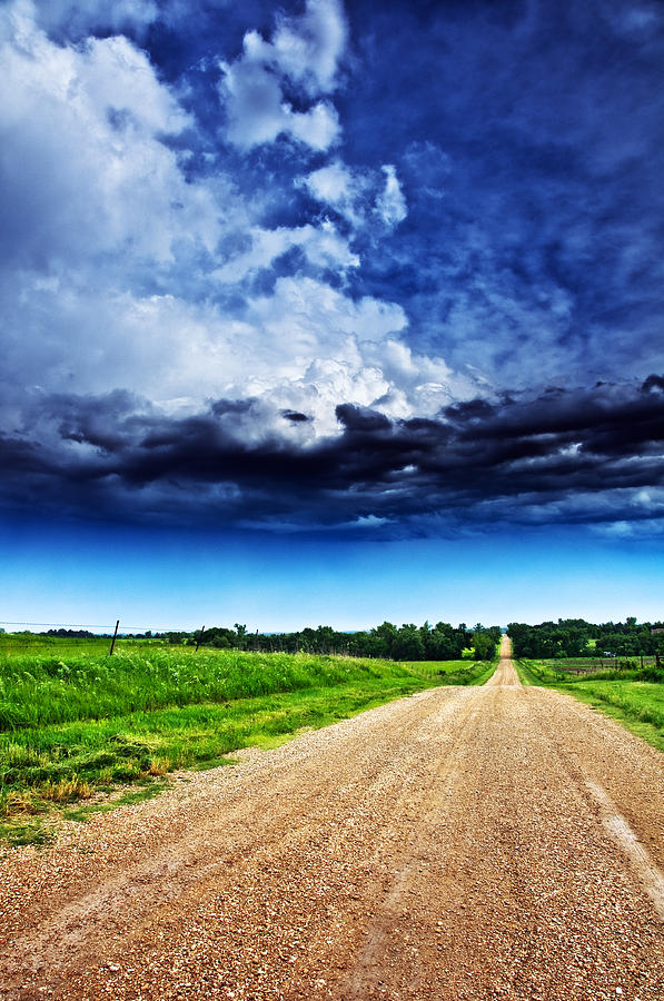 Spring Photograph - Forming Clouds over Gravel by Eric Benjamin