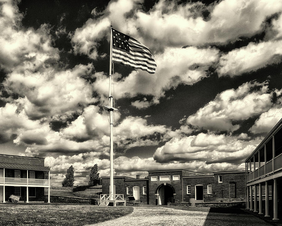 Fort McHenry Parade Ground and Storm Flag in Black and White Photograph by Bill Swartwout