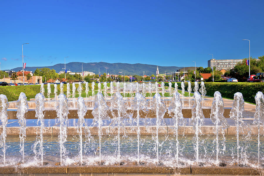 Fountains and cityscape in capital city of Zagreb Photograph by Brch Photography