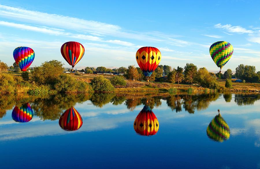 Four beautiful balloons Photograph by Lynn Hopwood