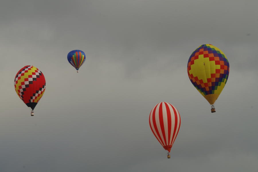 Balloon Photograph - Four in the sky by Jeff Swan