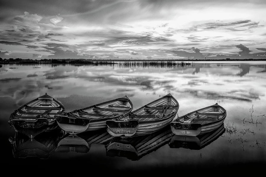 Four Old Boats Side by Side in Black and White Photograph by Debra and Dave Vanderlaan