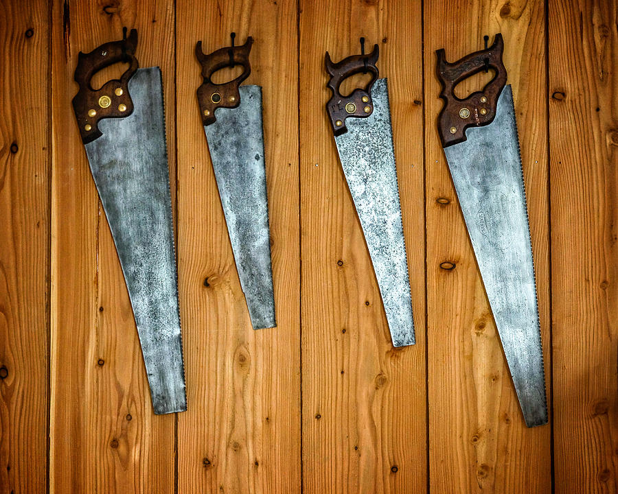 Four Saws on a Wall Photograph by Chris Bordeleau