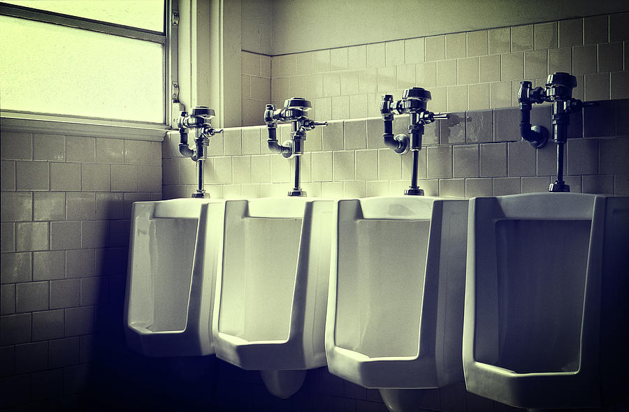 Four Urinals In A Row Photograph