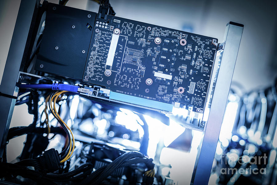 Fragment of cryptocurrency miner in a close-up shot. Photograph by Michal Bednarek
