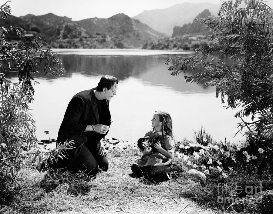 Frankenstein by the lake with little girl Boris Karloff Photograph by Vintage Collectables