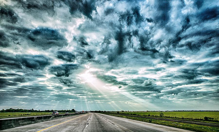 Freeway Through Country Landscape With Dramatic Skyes And Sun Ra Photograph by Alex Grichenko
