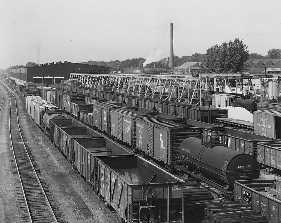 Freight Cars Parked in Machine Shop Photograph by Chicago and North Western Historical Society
