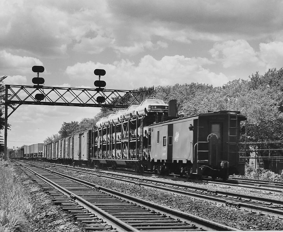 Freight Train Carrying Automobiles  Photograph by Chicago and North Western Historical Society