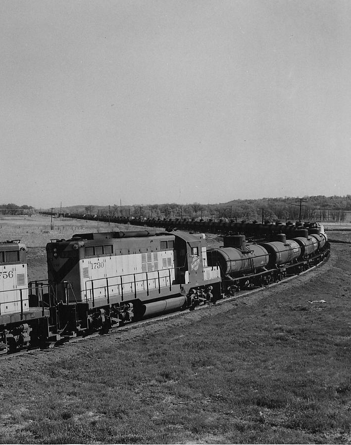 Freight Train Rolls Through Countryside - 1958 Photograph by Chicago and North Western Historical Society