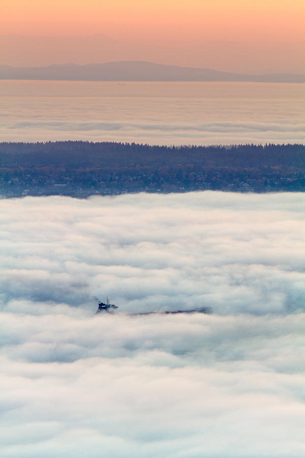 Freighter in the Clouds Photograph by Michael Russell