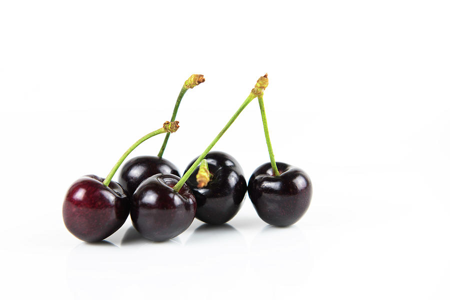 Fresh dark red cherry fruits. Photograph by Michalakis Ppalis