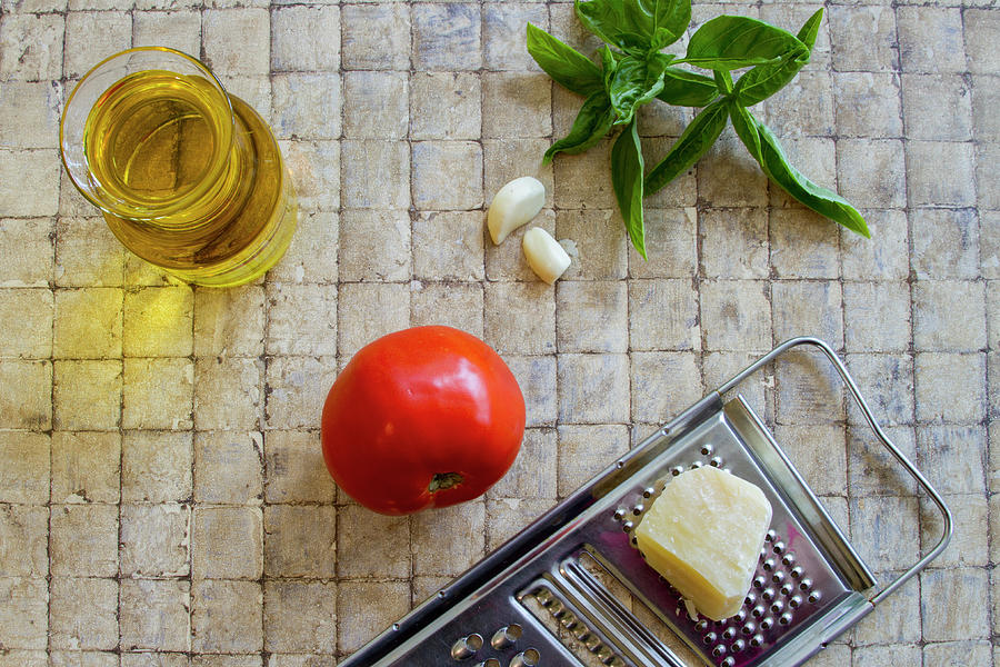 Fresh Italian cooking ingredients on tile Photograph by Karen Foley