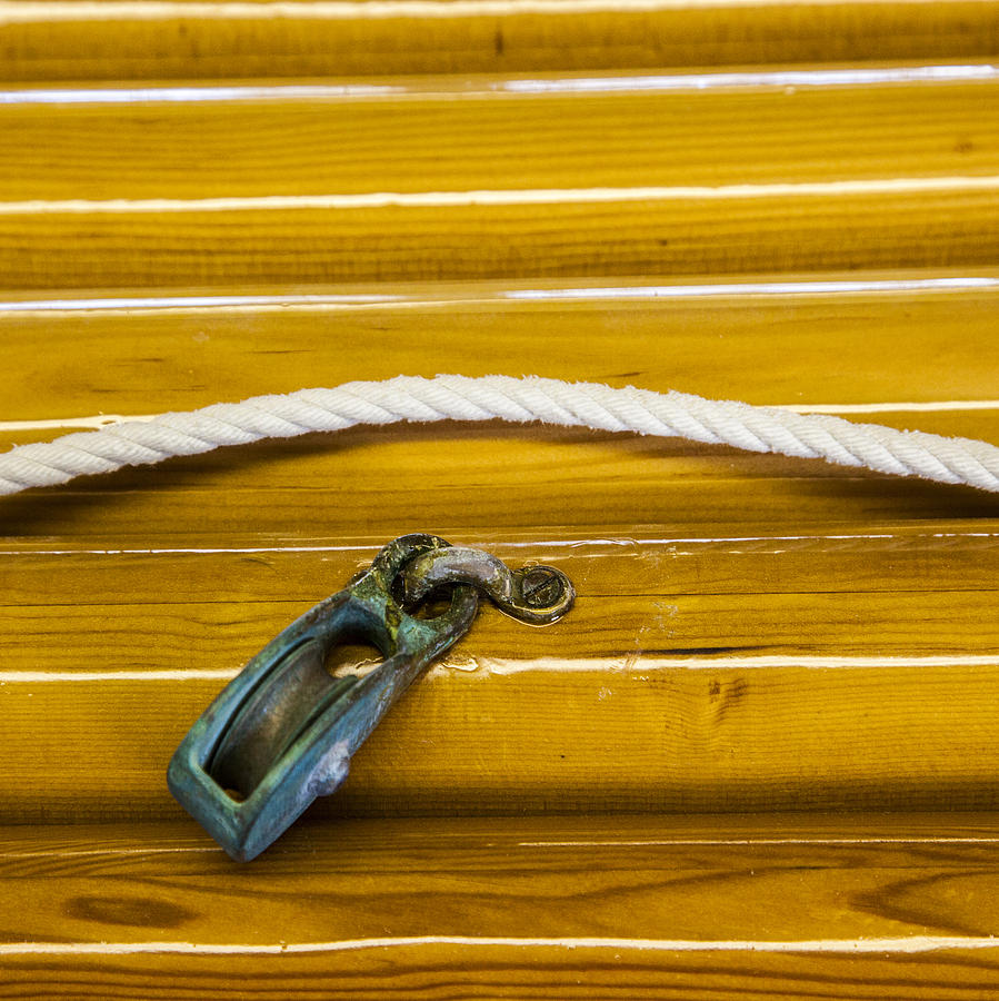 Fresh Varnish on Old Spars with rope and pulley Photograph by Charles Harden