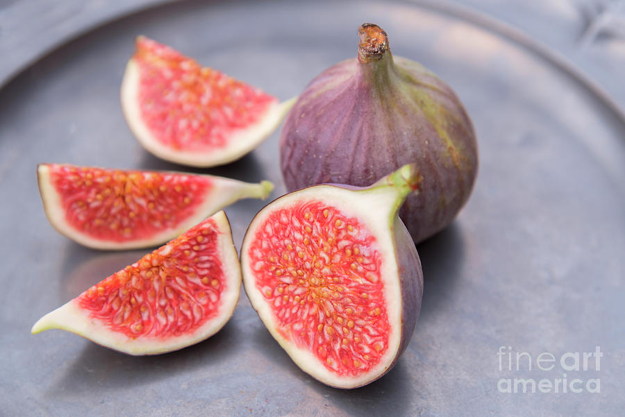 Freshly cut ripe figs Photograph by Sophie McAulay