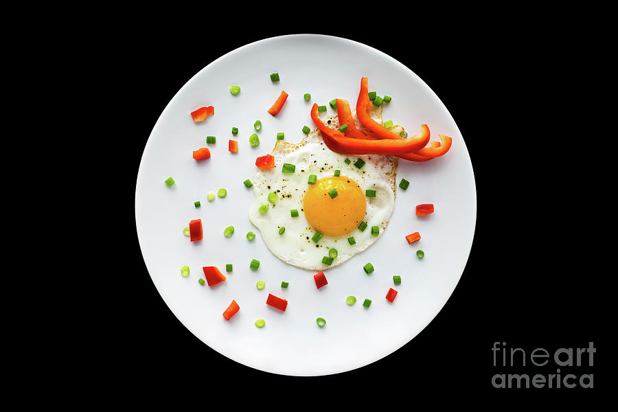 Spring Photograph - Fried eggs with sprouting onion and red bell pepper on a white p by Evgeny Drablenkov